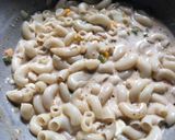 A picture of step 7 of Peri Peri white sauce Pasta.