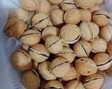 Pas rețetă Nuci umplute cu crema de nuca, biscuiți și cacao 3 fotografie