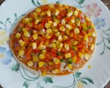 A picture of step 6 of Cheesy Mexican Veg Pizza.