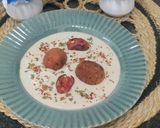 A picture of step 8 of Nargisi Malai Kofta with Cashew Kewra gravy.