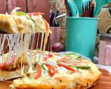 A picture of step 6 of Cheesy Chicken Tikka Pizza 🍕.