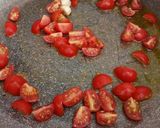 A picture of step 1 of Spaghetti with fresh cooked tomatoes and fresh herbs.
