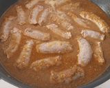 Foto del paso 10 de la receta: Cazuela de butifarra y calamarcitos con conchas