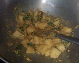 A picture of step 10 of Aloo posto.
