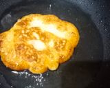 A picture of step 9 of Malpua with rabdi.