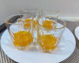 A picture of step 1 of Fruit custard with orange jelly and strawberry palm sauce.