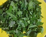 A picture of step 1 of Kochupata diye Chingri(Prawn with Colocasia leaves).