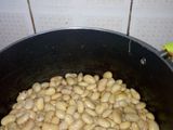Spiced White runners beans in grated carrots