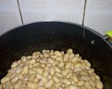 A picture of step 6 of Spiced White runners beans in grated carrots.
