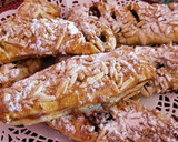 Foto del paso 7 de la receta: Cañas de hojaldre rellenas de turrón de chocolate y mermelada de naranja