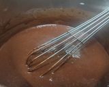 A picture of step 2 of Brownie cake with chocolate syrup.