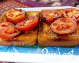 A picture of step 2 of Garlic Bread Toast with Roasted Tomatoes.