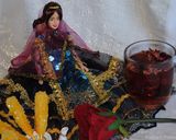 A picture of step 8 of Persian black tea with dried rose petals.