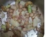 A picture of step 5 of Cauliflower biryani.