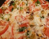 A picture of step 9 of Grated bread eggs pizza.