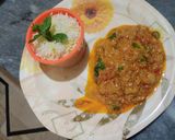 A picture of step 5 of Baingan ka bharta with boil rice.