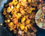 A picture of step 4 of Aloo chana masala.