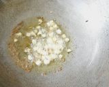 A picture of step 2 of Garlic coriander rice.