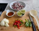A picture of step 1 of Squids in Lemongrass Spicy Soup.
