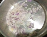 A picture of step 5 of Brain Masalah with tomatoes.