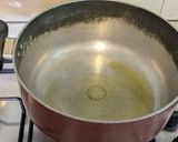 A picture of step 1 of Coconut milk rice.