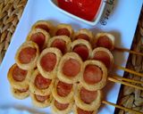 Foto langkah ke 5 dari resep Sate sosis gulung.