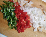 Foto del paso 1 de la receta: Salchichas con tomate