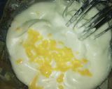 A picture of step 2 of White Chocolate Orange Mousse Parfat.