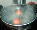 A picture of step 2 of Roasted carrot tomato soup.