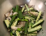 A picture of step 2 of Bhindi Capsicum Masala.