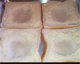 A picture of step 1 of Cheesy egg in a hole baked toast.