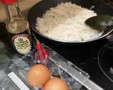 A picture of step 2 of Egg fried rice... and some chicken.