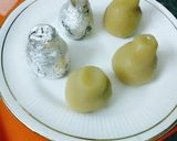 A picture of step 10 of Stuffed Badam kalash.