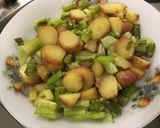 A picture of step 14 of Warm Potato and Asparagus Salad with Bacon, Tomatoes, and Sweet Onion.