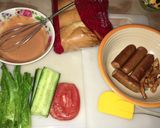 A picture of step 8 of 𝐻𝑜𝓉𝒹𝑜𝑔/𝒸𝒽𝒾𝒸𝓀𝑒𝓃 Sandwich.