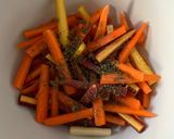 A picture of step 3 of Roasted Carrots with Thyme, Oregano, and Parsley.