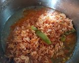 A picture of step 5 of Red Rice with Corn.