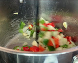 Foto del paso 2 de la receta: Garbanzos, chipirones y huevo frito