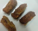 A picture of step 4 of Nutella banana Swiss rolls.