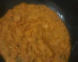 A picture of step 7 of Paneer stuffed potatoes in masala gravy.