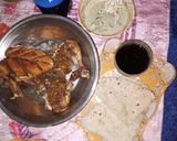 A picture of step 6 of Achari chicken broast.