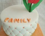A picture of step 9 of Chocolate with ground nuts cake covered in fondant.