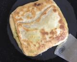 A picture of step 11 of Egg Mughlai Paratha.