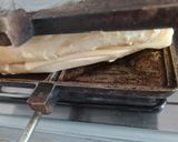 Foto del paso 4 de la receta: Sanguchito tostado de quesos Tybo y azul en sandwichera para hornalla
