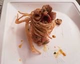 Foto del passaggio 1 della ricetta Spaghetti al prezzemolo fritti con persico saltato e pomodorini