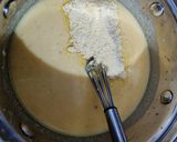 A picture of step 1 of Onion pakoda curry.