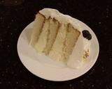 A picture of step 26 of Vanilla Layer Cake with Lemon Cream Filling and Lemon Whipped Cream Frosting.
