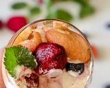 A picture of step 2 of Berry Tiramisu in wineglass.