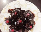 A picture of step 4 of Stuffed Dates in ganache.