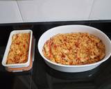Foto del paso 6 de la receta Arroz caldoso con pollo, tomate y pimientos rojos